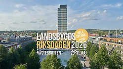 Foto på Sara kulturhus med logga för Landsbygdsriksdagen ovanpå.